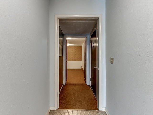 hall with carpet floors