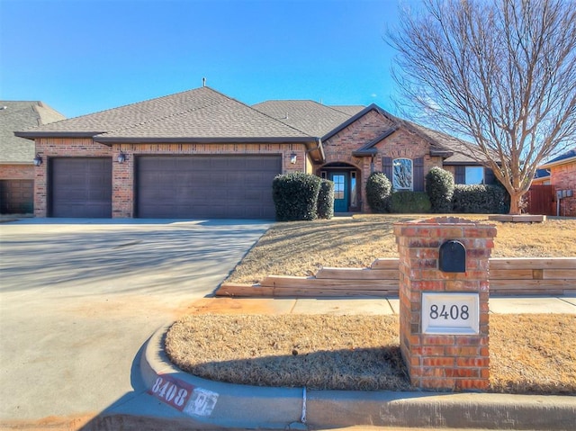 view of front of property with a garage