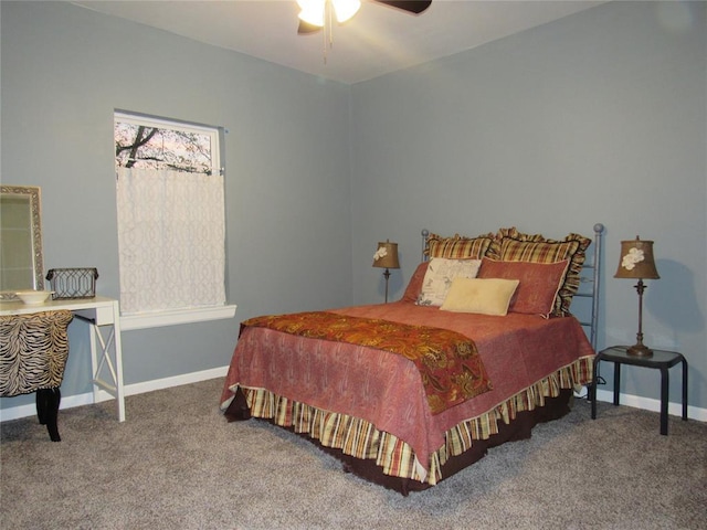 carpeted bedroom featuring a ceiling fan and baseboards