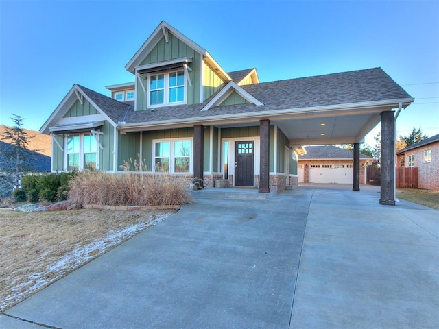 craftsman inspired home featuring covered porch