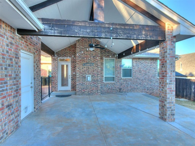 view of patio featuring ceiling fan