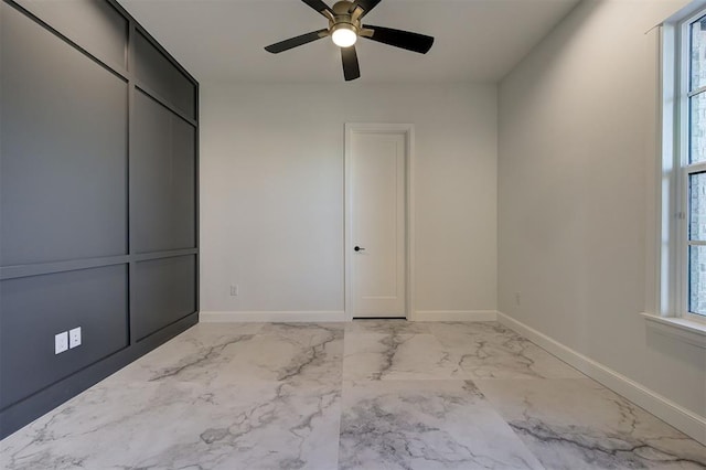 unfurnished bedroom with ceiling fan