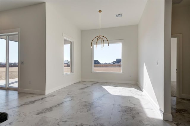 2270 NW 227th St, Edmond, OK 73025 - unfurnished dining area with marble finish floor, baseboards, and visible vents