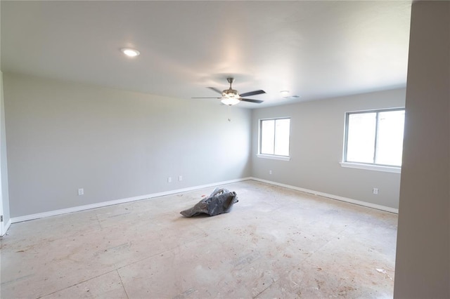 16024 Coneflower Dr, Edmond, OK 73013 - empty room with baseboards and a ceiling fan