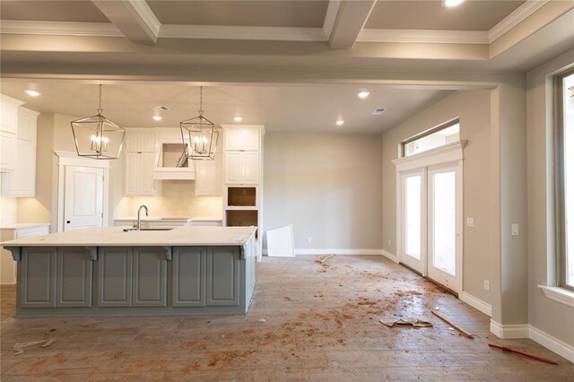 16024 Coneflower Dr, Edmond, OK 73013 - kitchen featuring gray cabinets, a sink, ornamental molding, white cabinets, and recessed lighting