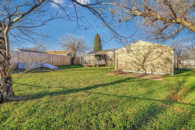 view of yard featuring a deck