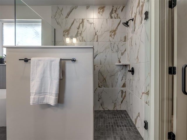 bathroom featuring tiled shower