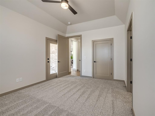 unfurnished bedroom with ceiling fan and light carpet