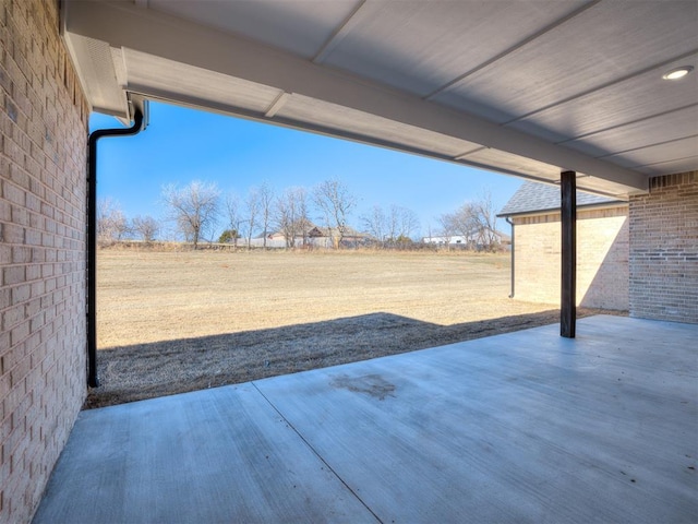 view of patio with a rural view