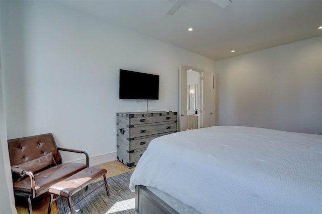 bedroom featuring ceiling fan and light hardwood / wood-style floors