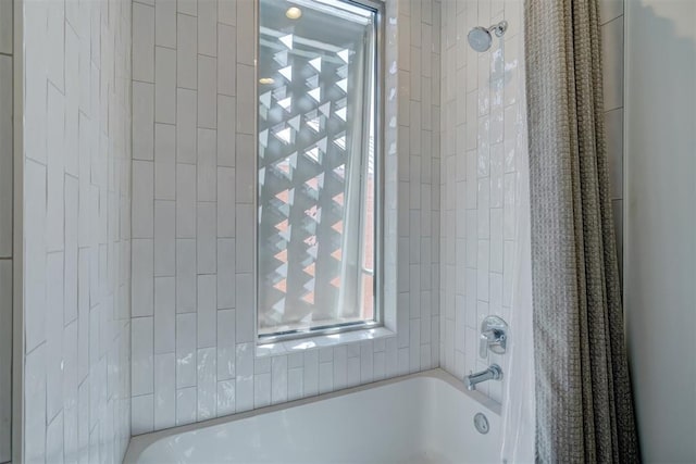 bathroom featuring shower / tub combo