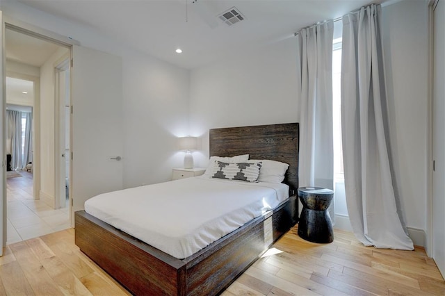 bedroom featuring light wood-type flooring