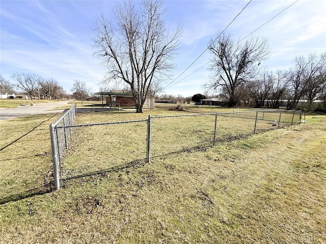 view of yard with a rural view