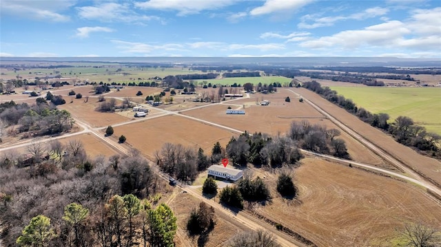 birds eye view of property featuring a rural view