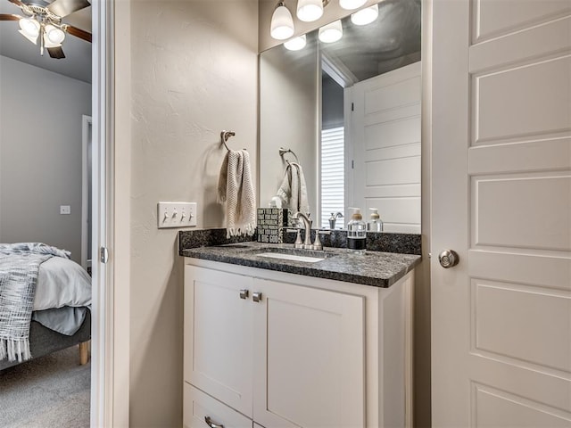 bathroom with vanity and ceiling fan