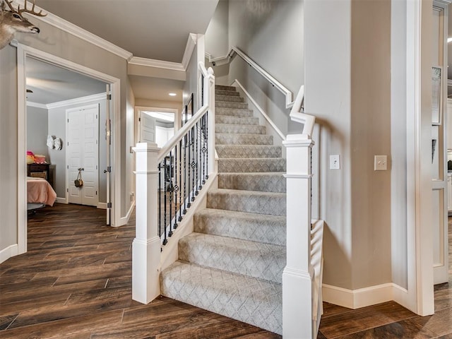 staircase with ornamental molding