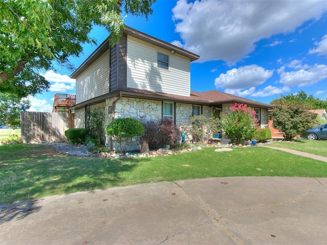 view of front of house with a front lawn