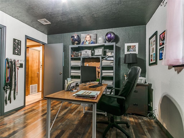 home office with hardwood / wood-style floors