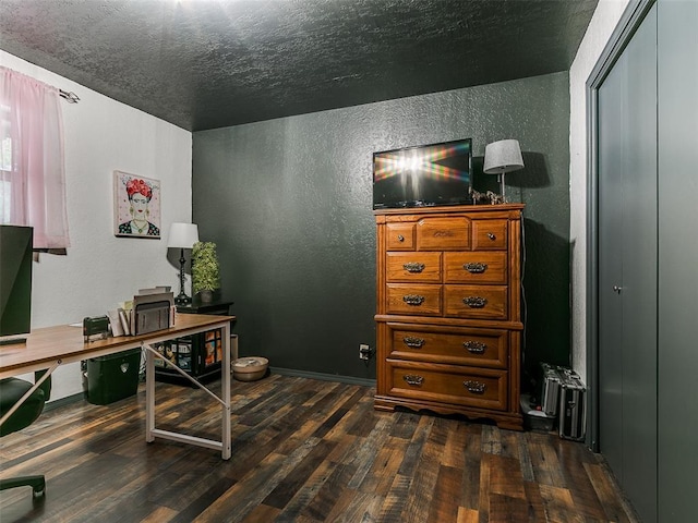 office with dark wood-type flooring