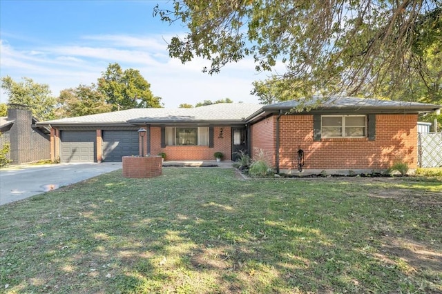 ranch-style house featuring a garage and a front lawn