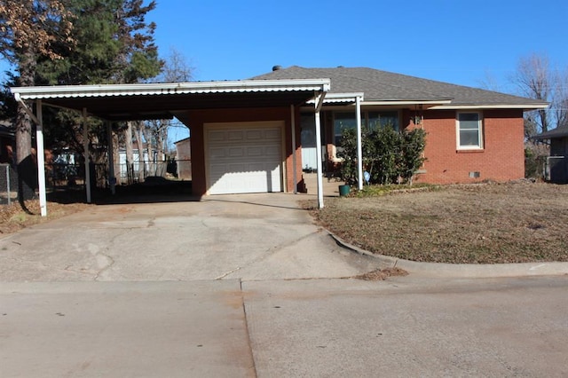 ranch-style home featuring a garage and a carport