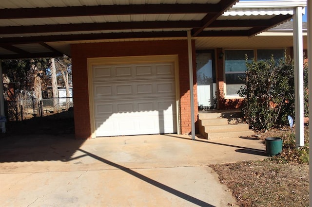 garage featuring a carport