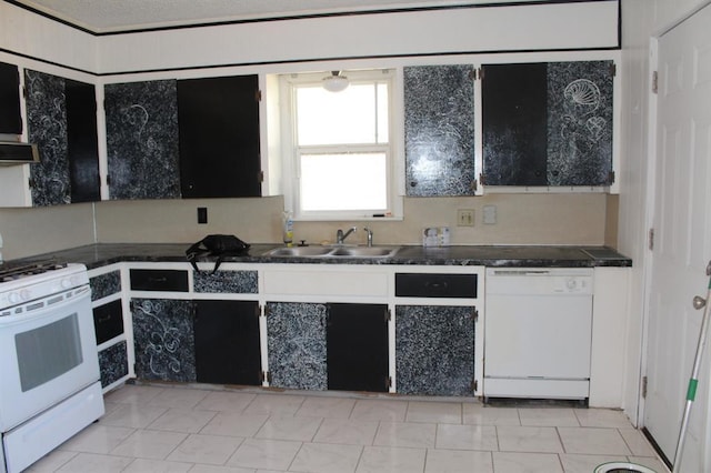 kitchen with sink and white appliances