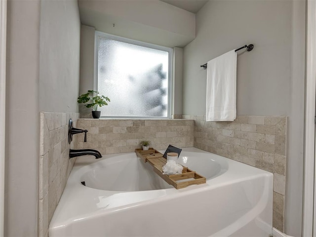 bathroom featuring a garden tub