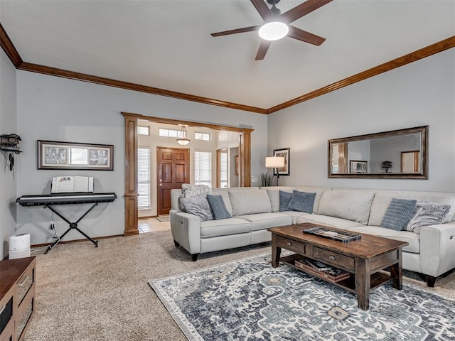 carpeted living room with crown molding and ceiling fan