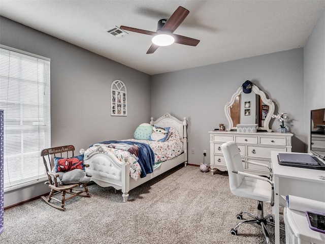 carpeted bedroom featuring ceiling fan