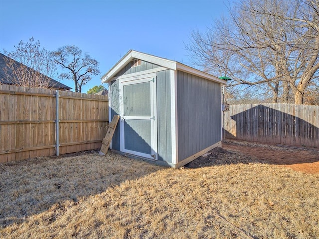 view of outbuilding featuring a lawn