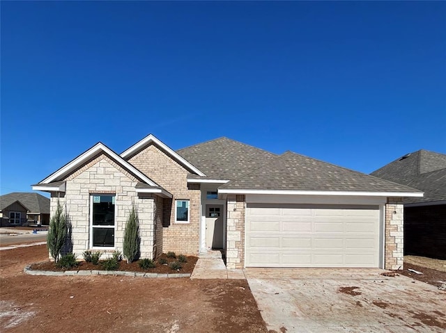 view of front of property with a garage