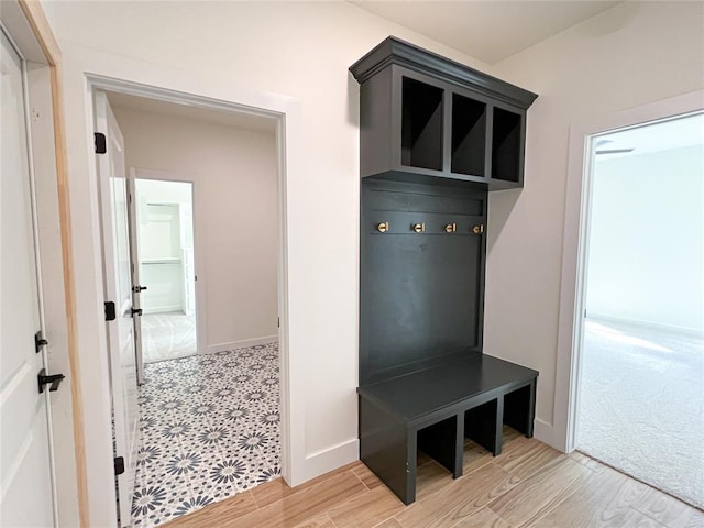 mudroom with hardwood / wood-style flooring