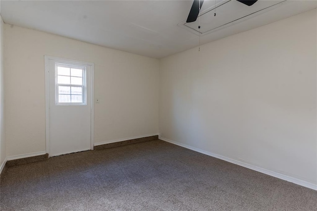 unfurnished room featuring carpet flooring