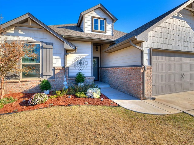 view of front of property with a garage