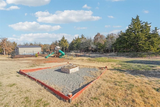 view of playground featuring a yard