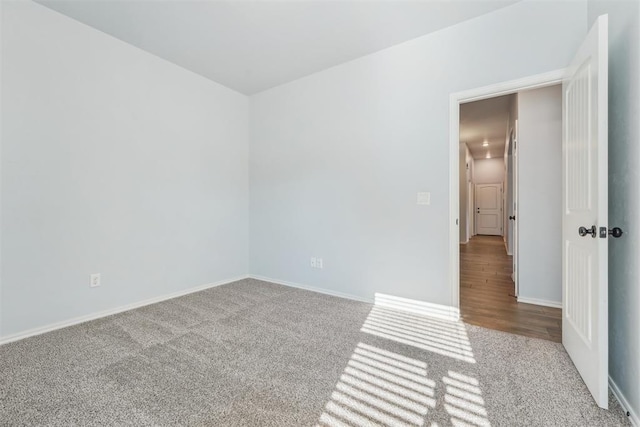 spare room with light colored carpet