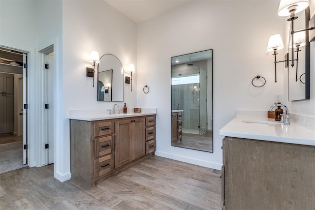 bathroom with vanity and walk in shower