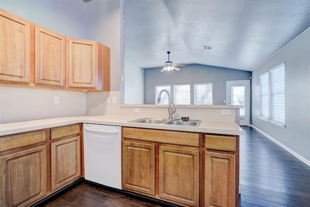 kitchen with white dishwasher, kitchen peninsula, ceiling fan, and sink