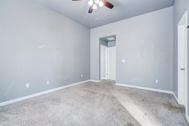 empty room with carpet floors and ceiling fan