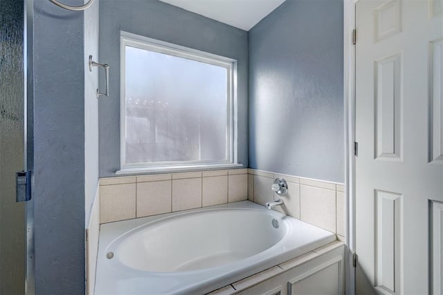 bathroom with a washtub