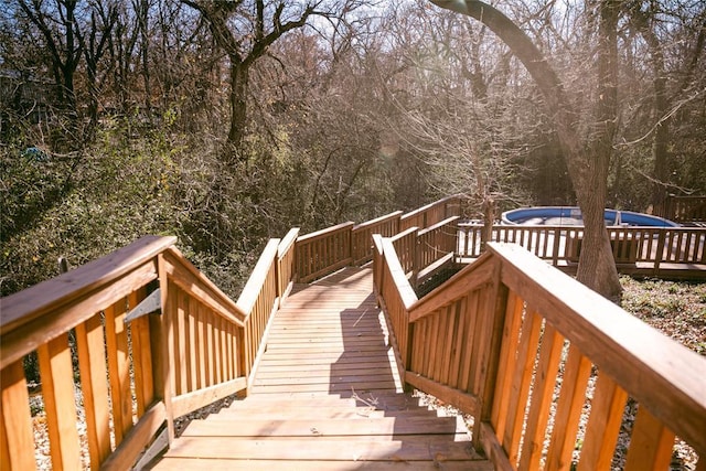 view of home's community with a wooden deck