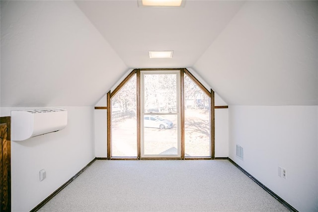 additional living space with carpet floors and vaulted ceiling