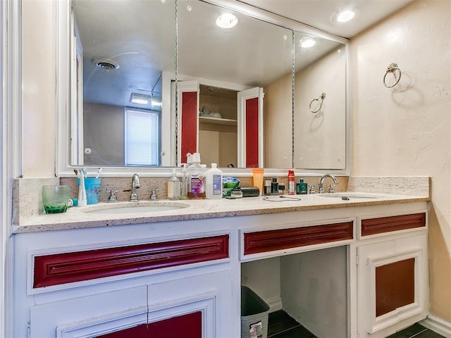 bathroom featuring tile patterned floors and vanity