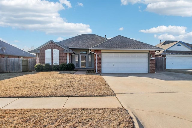 ranch-style home with a garage