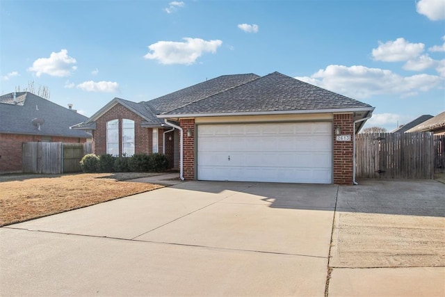 ranch-style house featuring a garage