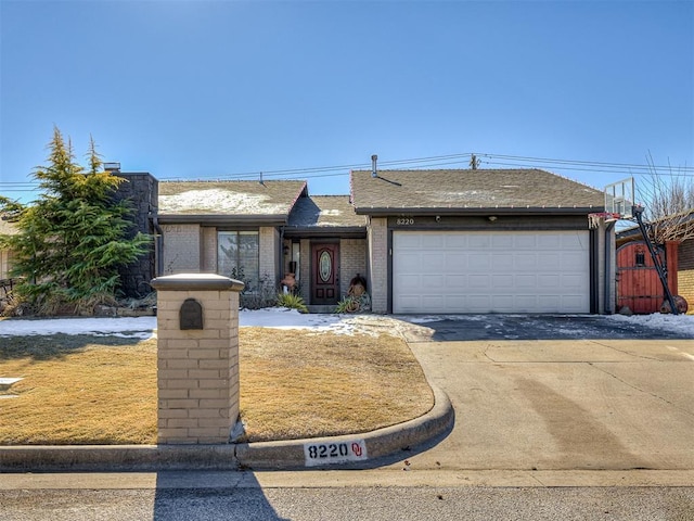 view of front of property featuring a garage