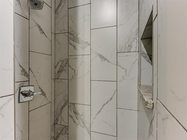 room details with a tile shower