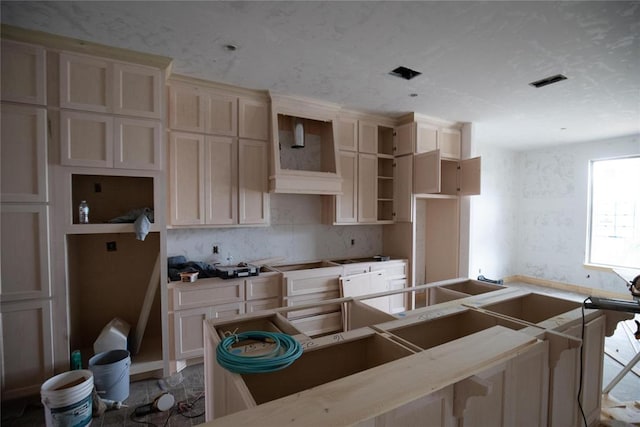 11113 NW 91st St, Yukon, OK 73099 - kitchen with decorative backsplash, open shelves, and visible vents
