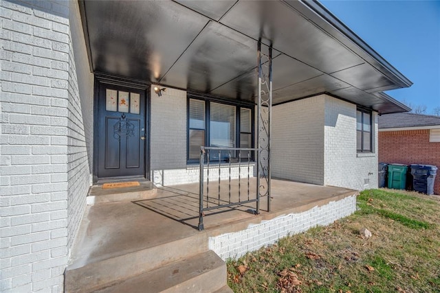 doorway to property with a porch